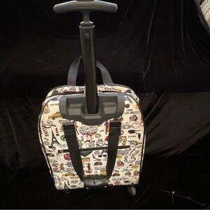 Two bags roller bag and shoulder bag that match